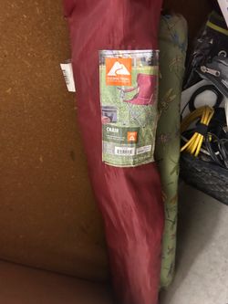 Small tent and two camp chairs