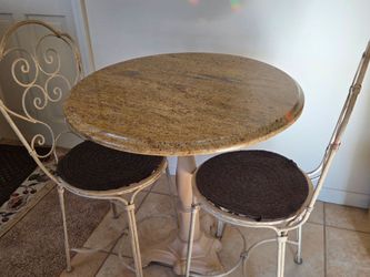 Granite  Bistro Table with chairs.