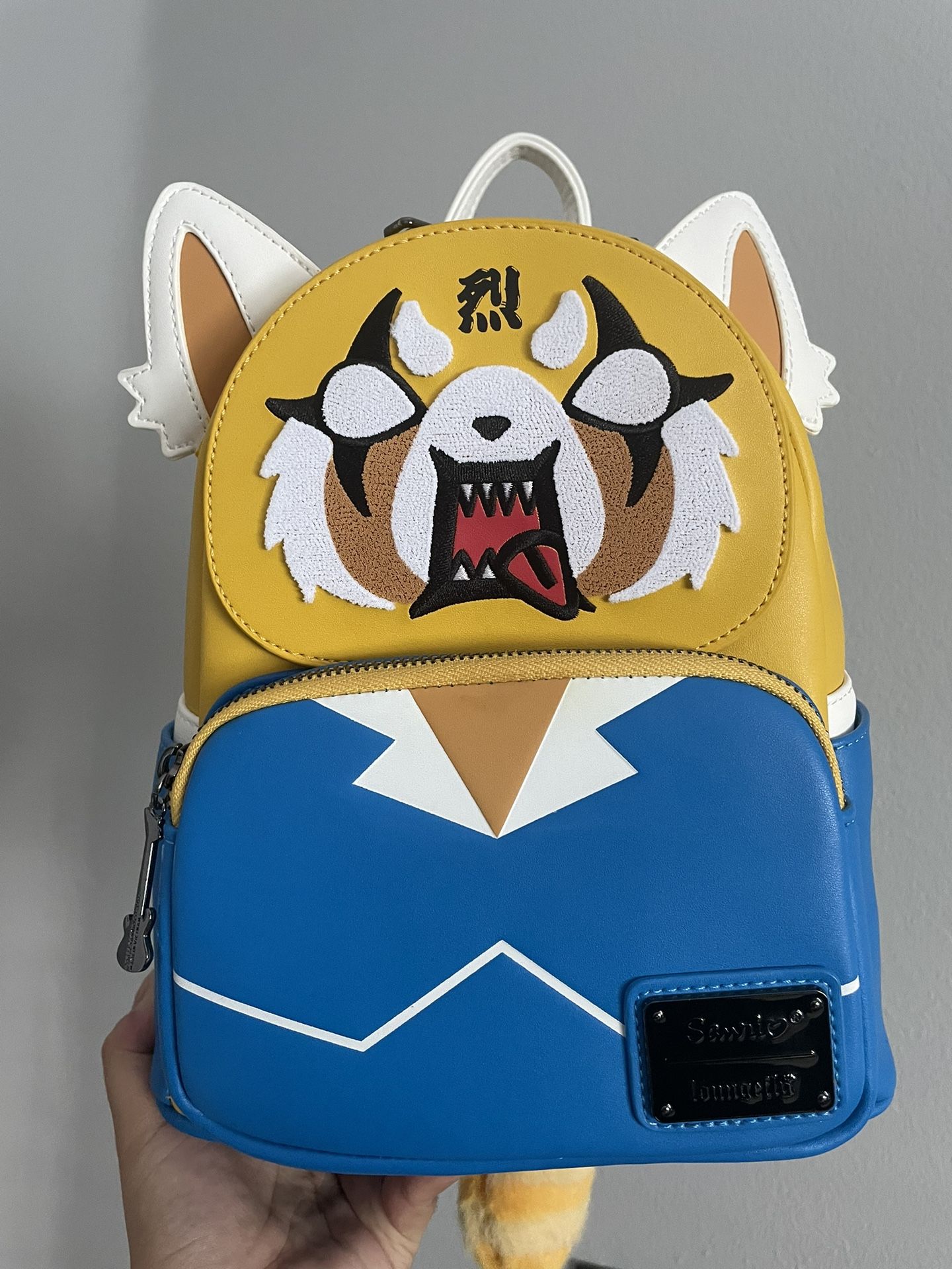Loungefly Anime Sanrio Aggretsuko Two Face Cosplay Mini Backpack