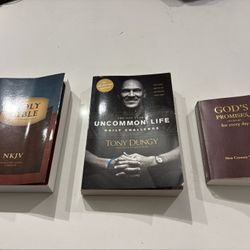 Three Christian Paperback Books: King James Bible, Bible Guide, and Tony Dungy’s Uncommon Life