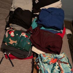 Stacks of all types of clothes