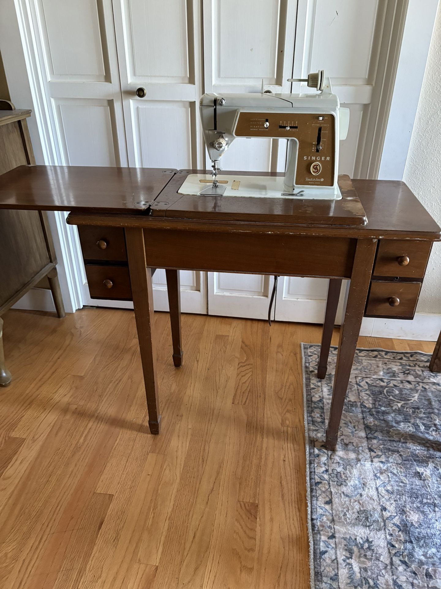 Singer Sewing Machine In Cabinet
