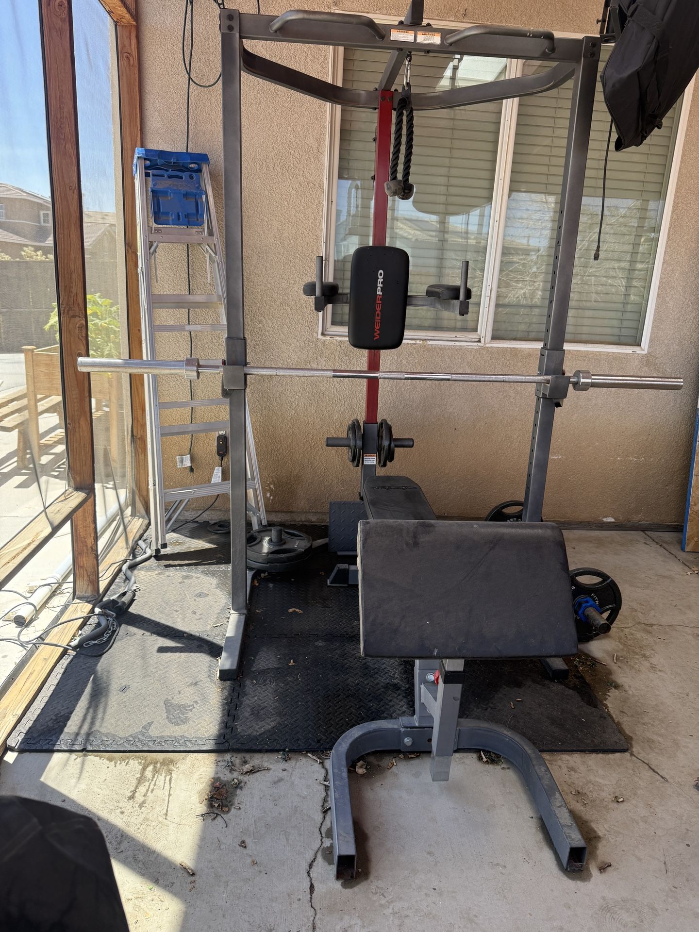Weirder pro power rack + 300lb Olympic weight set