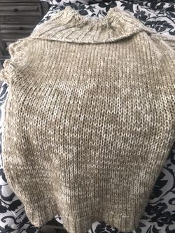 Sleeveless sweater, large