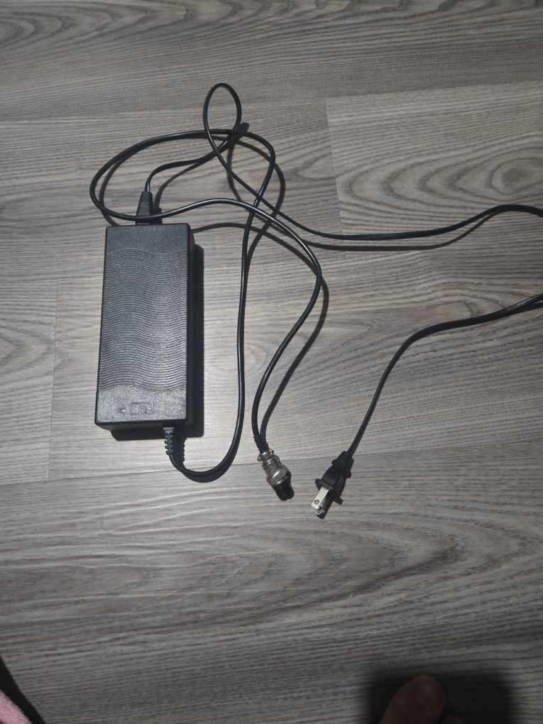 AI Overview
+3
This is an AC/DC Charger, model XVE-(contact info removed), Or An Air Wheel Charger