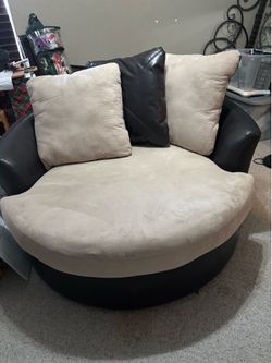 Brown swivel chaise