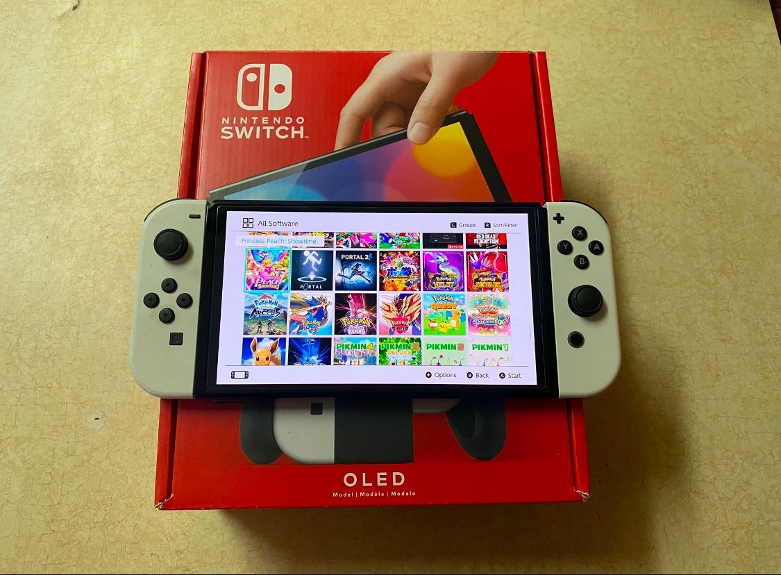 NINTENDO SWITCH OLED with 125 POPULAR GAMES