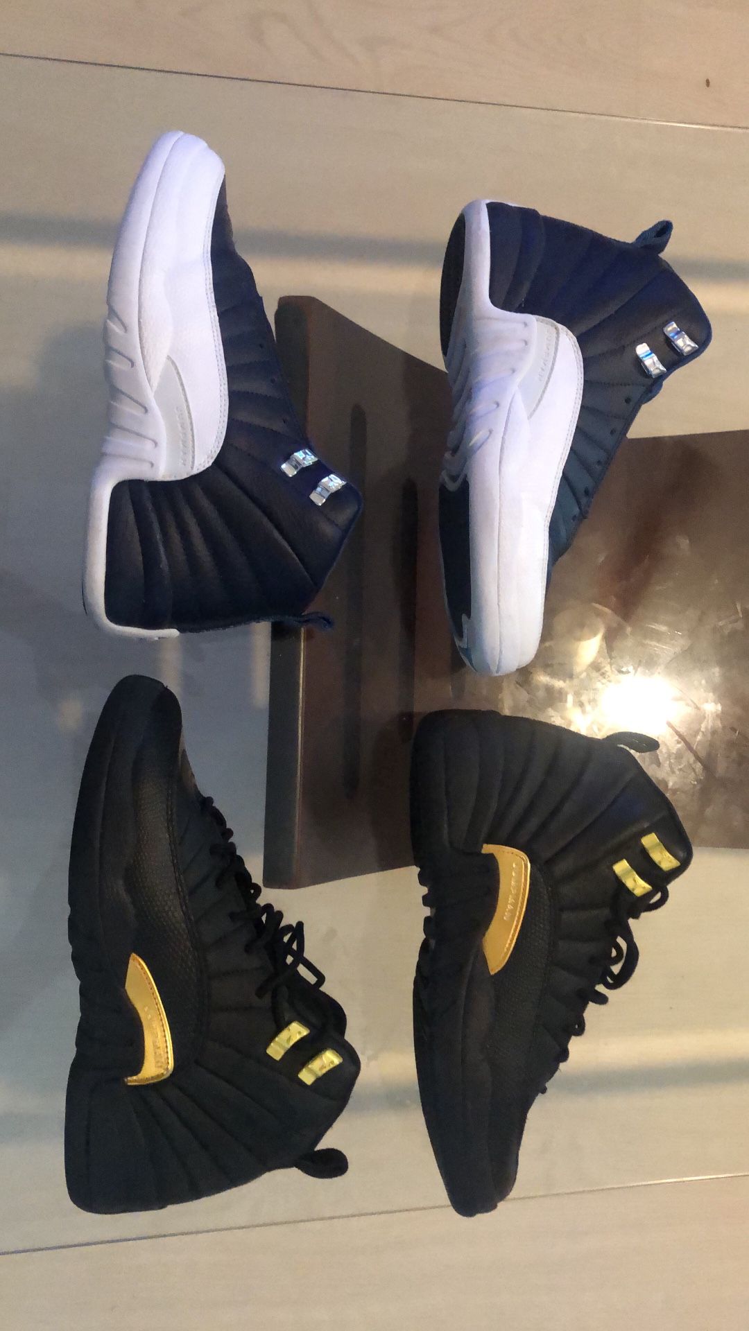 Jordan 12s Navy And White,  Black And Gold  Both Are 6y  $ 55ea