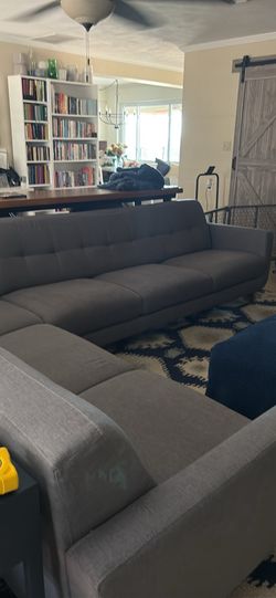 Living Spaces Gray Tufted Mid Century Sectional