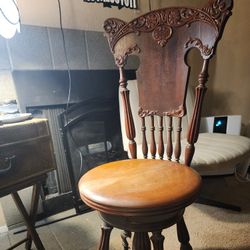 Victorian swivel piano chair dating from around 1890 to 1910.
