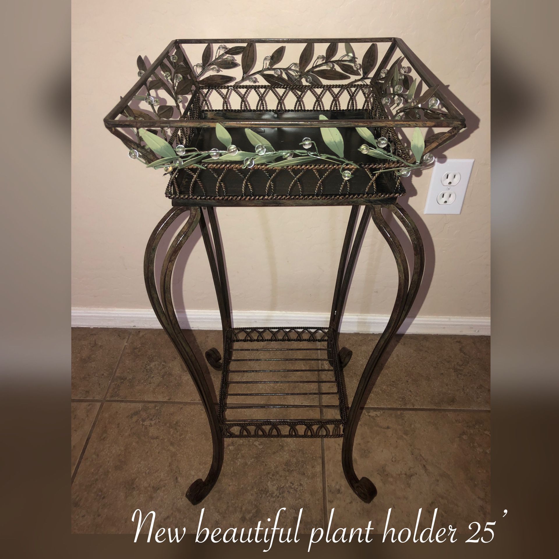 New beautiful plant holder brown metal 25’inches $40 Firm