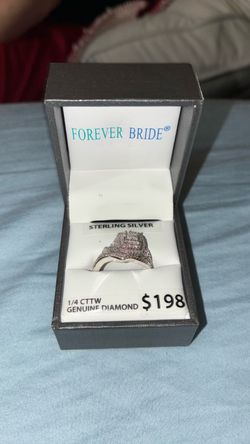 Sterling silver ring 1/4 of a CTTW diamond