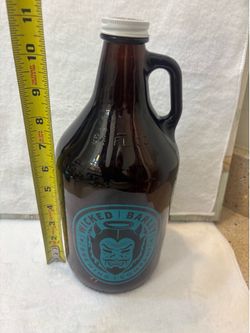 Vintage 64-ounce amber glass growler from Wicked Barley Brewing Company.  Excellent condition   Holds 64 ounces of liquid. The growler measures approx