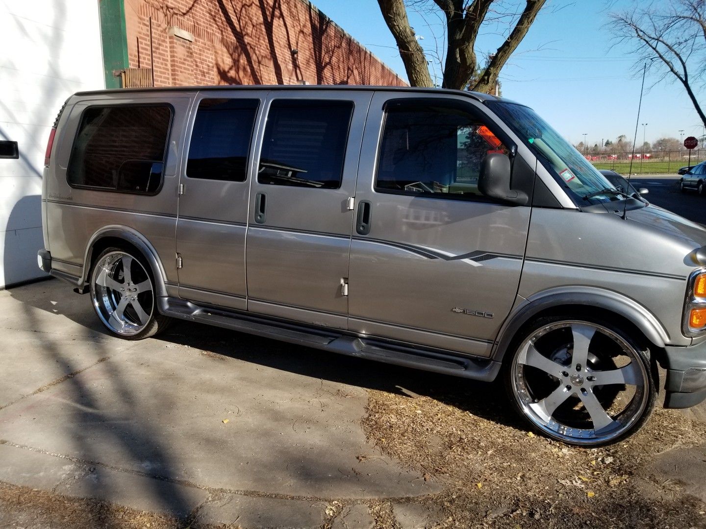 01 chevy express conversion van with 26" vellano