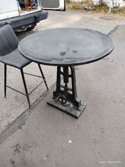 Antique shop table all steel raises and lowers great conversion piece.