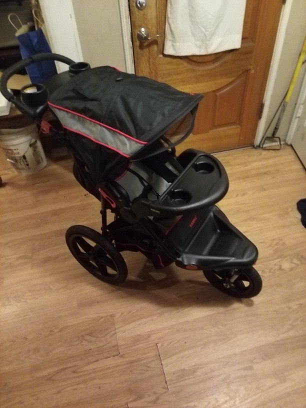 A Baby Trend Range Jogger Stroller