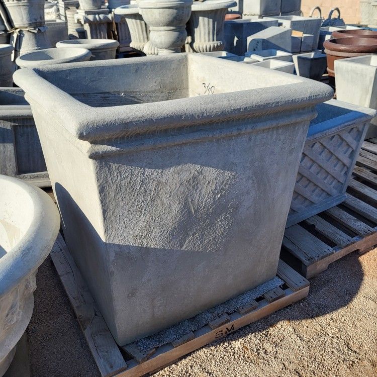 36X36X36 CONCRETE CEMENT PLANTER POTS $350 EACH.