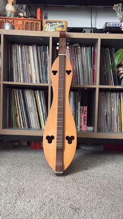 Scroll neck hand carved Appalachian dulcimer instrument