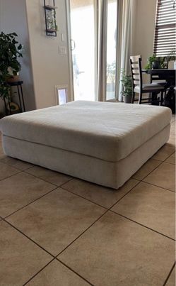 REDUCED Living Spaces Cocktail Ottoman Beige  52”