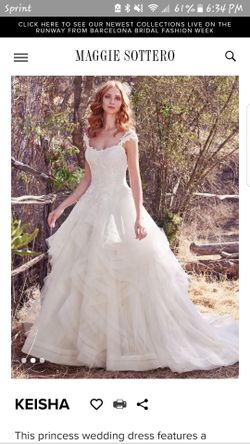 Wedding dress size 14 , bust max :42 and waist :34
