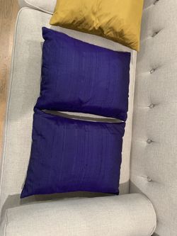 2 purple accent pillows 10”x14”