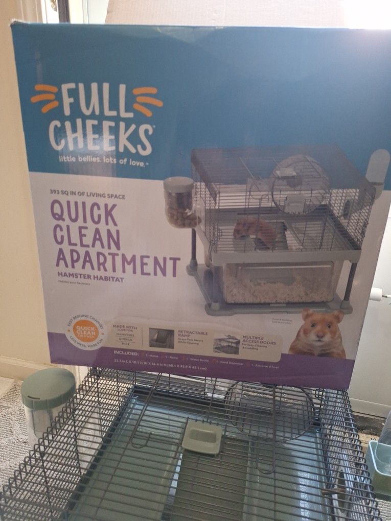 Hamster cage practically new 