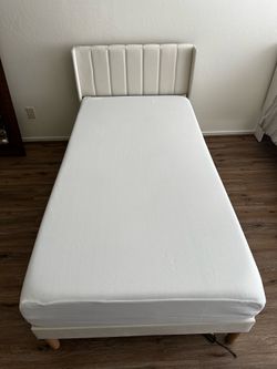 Twin bed with mattress