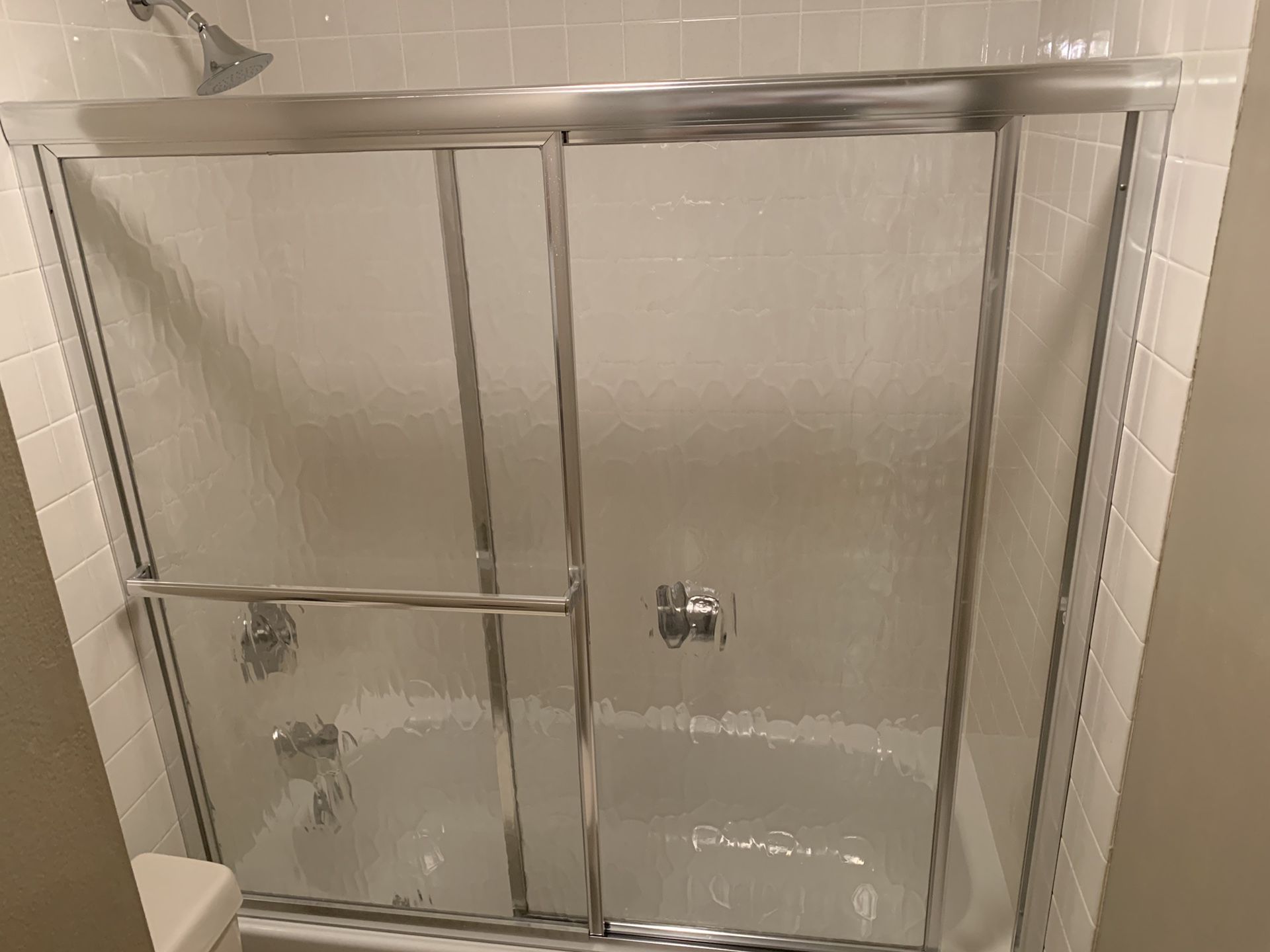 58.5” wide by 55” tall tub shower door