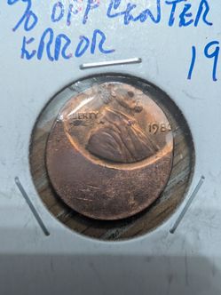 Off center 1980 Lincoln cent coin