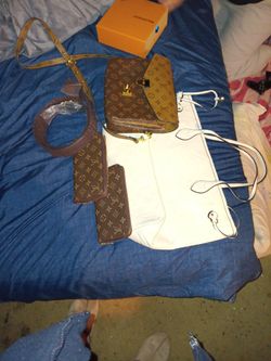 2 Hand Bags 1 Belt And 2 Wallets For 250.00