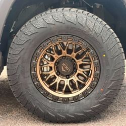 17x9 Combat Lock Off-road Rims And Tires 285/70/17 RBP AT