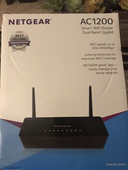 Netgear AC1200 WiFi router. Brand new never used. In original box with wrapping