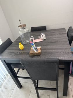 Ashley Furniture dining table and 4 chairs