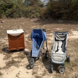 2 Strollers. 