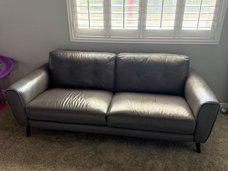 Gray leather couch and recliner