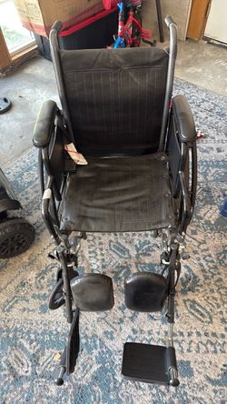 Black Manual Wheelchair with Footrests