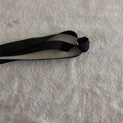 Black really can hold anything and it’s great to put over your neck or anything like that. It stretches and it can get longer.