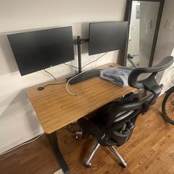Adjustable Desk with Dual Monitors (24’) and Ergonomics Chair