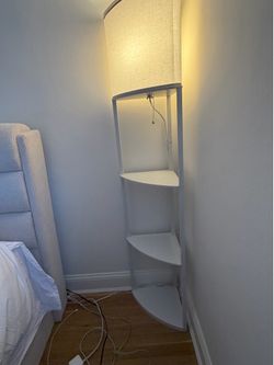 corner shelving with built-in lamp