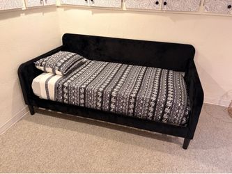 Black velvet daybed frame, mattress, topper, and blanket