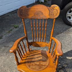 Vintage Dolphin Pressed Back Rocking Chair w/ Cane Seat