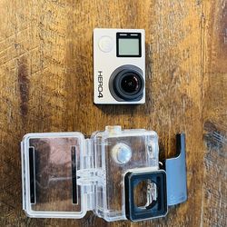 GoPro Hero4 with case and charging cable