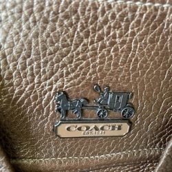 Coach. Purce. Exelente