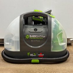 a Bissell Little Green Pet Deluxe Portable Carpet Cleaner and Car/Auto Detailer.