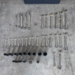 Wrenches, screwdriver and toolbox make an offer