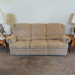 Couch With Recliner At Both Ends, Matching Rocker Recliner, The 2 End Tables And Nice Window Table.