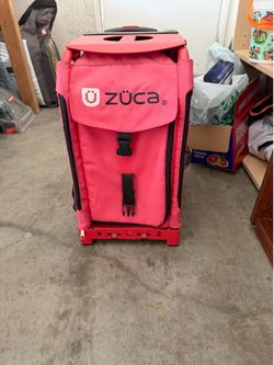 Zuca red frame.  Wheels light up