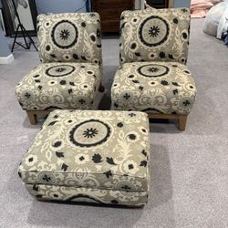 2 plush lounge chairs with ottoman
