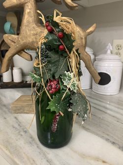 Christmas bottle.  Has a hole for lights