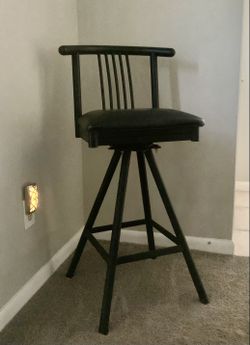 Set of four swivel bar stools